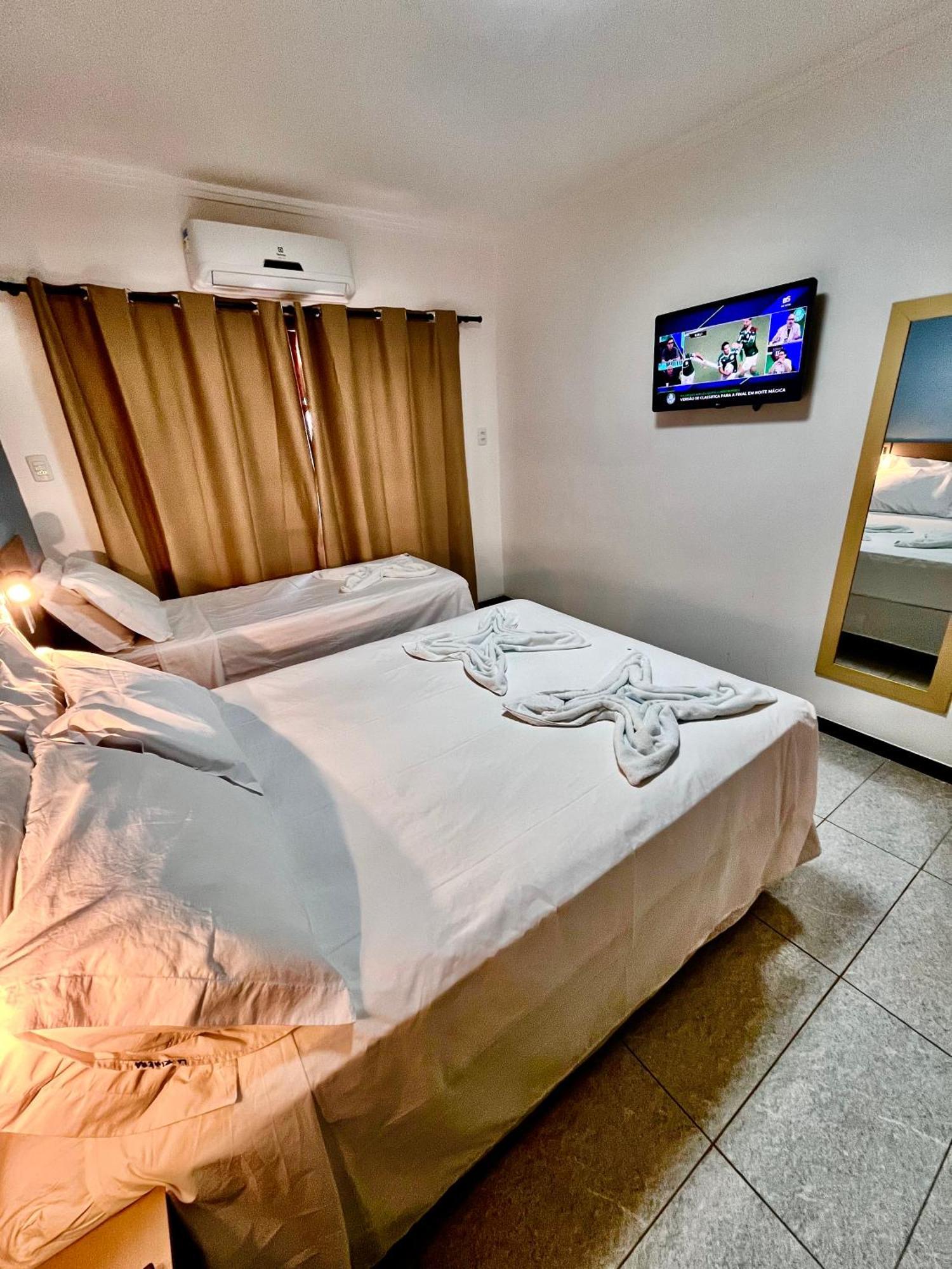 Quarto Triplo com Varanda